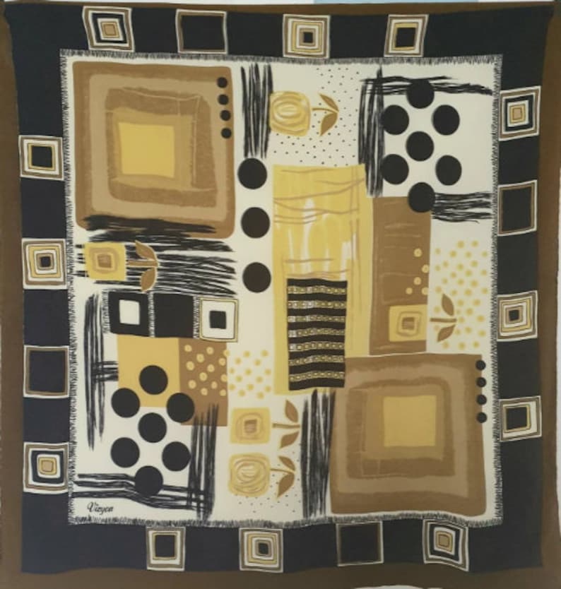 May include: Square silk scarf with an abstract design in shades of brown, black, and yellow. The scarf features geometric shapes, including squares and circles, and floral accents. The border is a dark brown with square patterns.