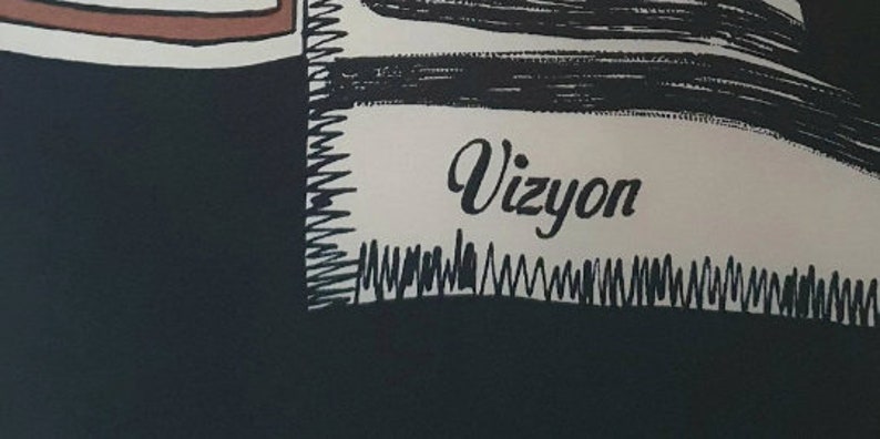 May include: Black and white graphic design with the word "Vizyon" in a cursive font. The design includes a black background, a white rectangular shape with the text, and a brown and white rectangular shape at the top.