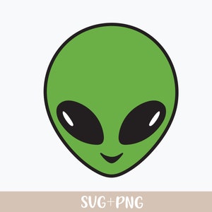 May include: Green alien face with black eyes and a smile. The alien has a simple, cartoon-like design.