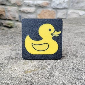 Gumowa kaczuszka – osłona zaczepu przyczepy (uniwersalna 2&quot;x2&quot;)
