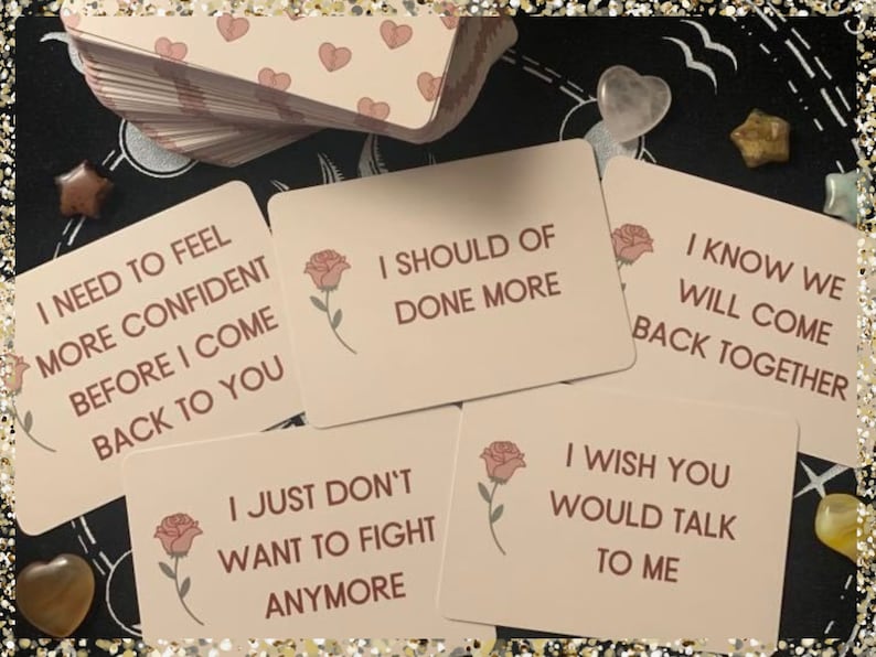 May include: A set of pink affirmation cards with rose illustrations and text. The cards feature phrases like "I need to feel more confident before I come back to you" and "I know we will come back together".