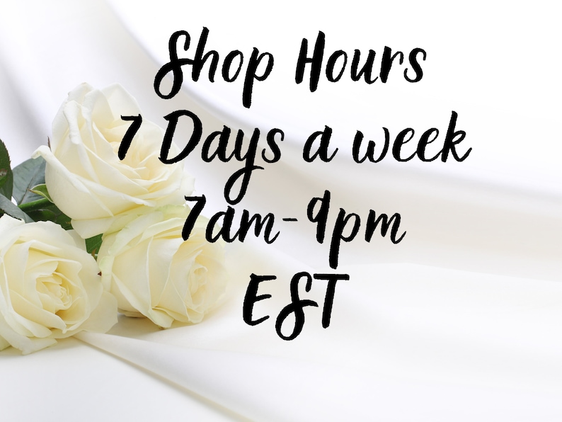 May include: Shop hours are 7 days a week from 7 am to 9 pm EST. The image features three white roses on a white fabric background.