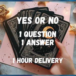May include: A hand holding a deck of tarot cards with a celestial design. The cards are on a pink surface with gold stars and a gold star-shaped decoration. Text on the cards reads "YES OR NO, 1 QUESTION 1 ANSWER, 1 HOUR DELIVERY."
