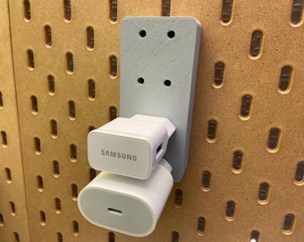 Power supply charging cable plug holder for the Ikea Skadis Pegboard