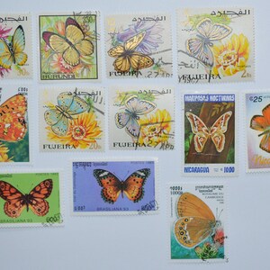 Lot Of 12 Old Used Stamps With Butterfly Motif