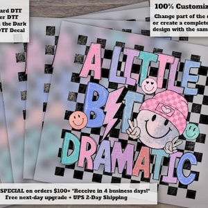 May include: A stack of DTF decals with a colorful design. The design features the text "A Little Bit Dramatic" with smiley faces and a lightning bolt. The decals are customizable and available in glitter and glow-in-the-dark options.
