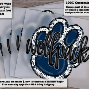 May include: A stack of heat transfer sheets featuring a navy blue paw print design with the word "wolfpack" in black script. The paw print has a white and gray splatter effect. Text on the sheets reads "Extra-wide cut margins" and "100% Customizable!"