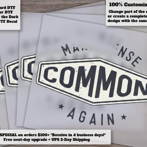 May include: A stack of square DTF transfer sheets featuring a graphic design with the text COMMON enclosed in a white diamond shape with a black border. Above the diamond is the word SENSE and below is the word AGAIN with two small stars.