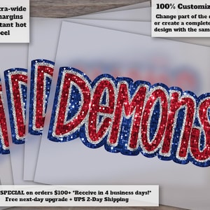 May include: A stack of white papers with the word "DEMONS" in red glitter letters outlined in blue glitter. The text "Extra-wide cut margins Instant hot peel" is in the upper left corner. The text "100% Customizable!" is in the upper right corner.