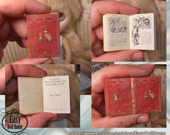 May include: A miniature red book with gold accents, titled "Alice's Adventures in Wonderland" by Lewis Carroll. The book is open to reveal illustrations of Alice and the Dodo.