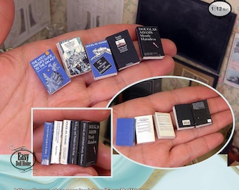 May include: A collection of miniature books, including "The Hitchhiker's Guide to the Galaxy", "Life, the Universe and Everything", and "Mostly Harmless" by Douglas Adams. The books are all in 1:12 scale.