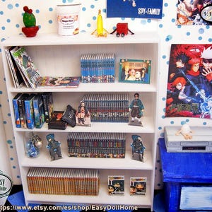 May include: A miniature white bookshelf filled with anime-themed books, DVDs, and figurines. The shelf also holds a small cactus, ice cream, and a poster that says "SPY x FAMILY".