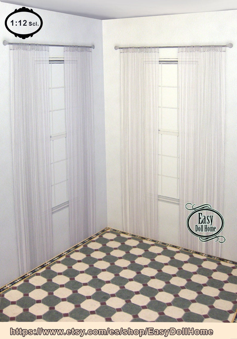 May include: Miniature dollhouse window with sheer white curtains. The curtains are hung on a silver rod. The room has white walls and a patterned floor. The text "1:12 scl." is in the upper left corner.