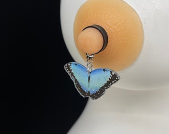 Blue and black butterfly, with light glitter