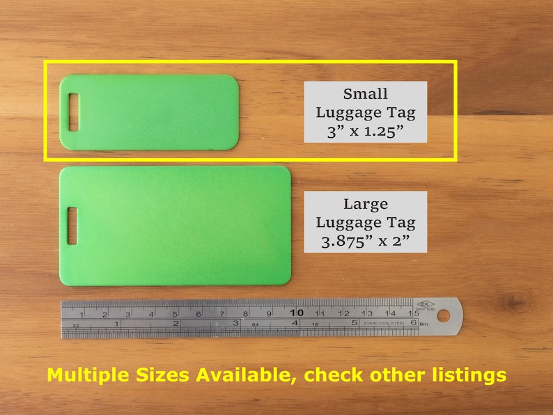 May include: Two green luggage tags, one small and one large, on a wooden surface. The small tag measures 3 inches by 1.25 inches. The large tag measures 3.875 inches by 2 inches. A ruler is below the tags. The text "Multiple Sizes Available, check other listings" is at the bottom of the image.