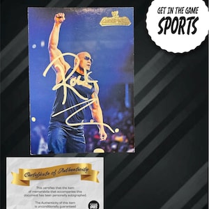 The Rock signierte WWE Karte