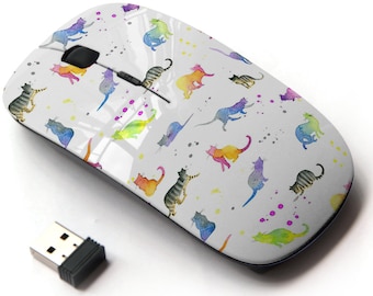 May include: A white wireless computer mouse with a colorful watercolor design of cats. The mouse has a small USB receiver.