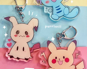 Poke | cute clear double-sided acrylic keychain charm - double sided anime monster charms