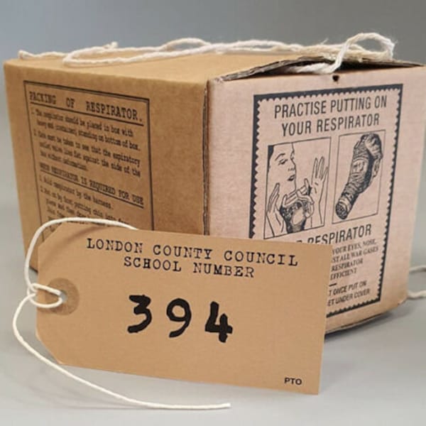 1940s/WW2 Blitz Wartime Memorabilia Historically accurate Air Raid-Gas mask Box includes a school printed luggage label