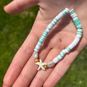 swirls of blue and white with a starfish