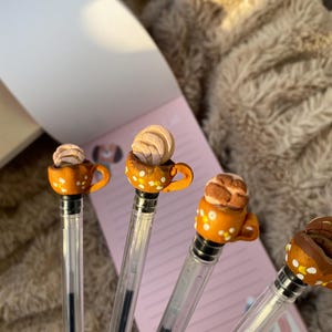 Handcrafted pen with small polymer clay cups and a sweet bread shell. Mexican handicrafts ready to ship