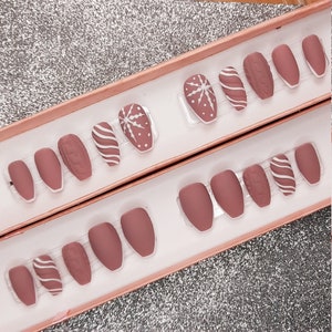 Pretty in pink winter press on nails.