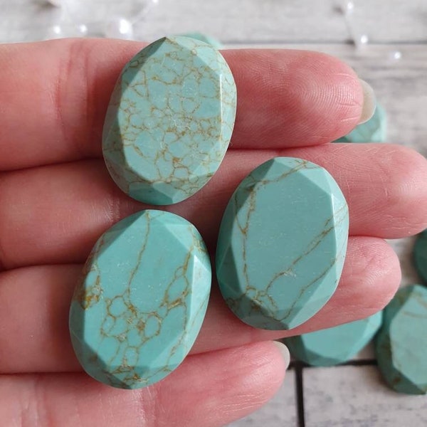 2er turquoise right. faceted 25 x 17 mm facet cut Cabochon oval