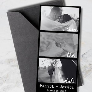 May include: A white ceramic mug with a black handle and the text "But First, Coffee" in a bold, black font. The mug is set against a blurred background, suggesting a cozy setting.