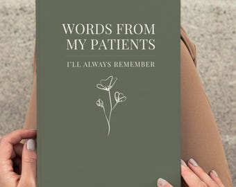 May include: A sage green journal titled "WORDS FROM MY PATIENTS" with the text "I'LL ALWAYS REMEMBER" and a floral illustration. The journal is held open in a person's hands, with a ring visible on the finger.