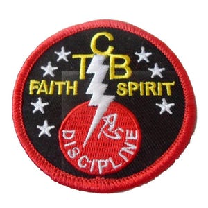 May include: Circular patch with a black background, red border, and a red circle at the bottom. The patch features the text "C T B FAITH SPIRIT DISCIPLINE" in yellow and white, along with a white lightning bolt and white stars.