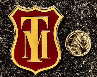 Malory Towers the musical school uniform enamel pin badge.