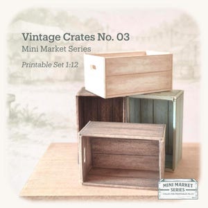 May include: A stack of four miniature wooden crates in varying shades of brown and green. The top crate is light brown, and the text "Vintage Crates No. 03" and "Mini Market Series" are visible. The set is labeled "Printable Set 1:12".