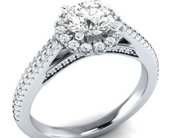 May include: A silver engagement ring with a large, round, clear center stone surrounded by a halo of smaller stones. The band is also set with smaller stones.