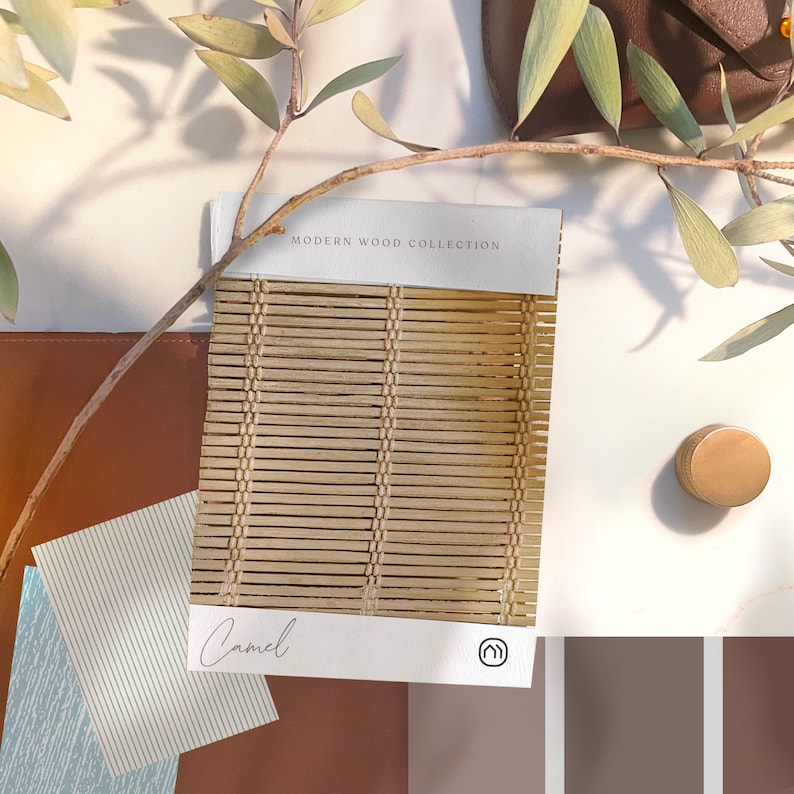May include: A sample of woven wood blinds in a light brown colour called "Camel". The sample is labelled "Modern Wood Collection".