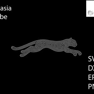 May include: A white rhinestone design of a cheetah running, with the text "iLekasia Tribe" above it. The design is 11.62 inches wide and 3.17 inches tall, and is made up of 635 clear crystals.