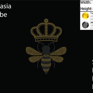 May include: A gold rhinestone crown sits atop a black and gold rhinestone bee. The design is 8.394 inches wide and 11.567 inches tall. The design is made with 935 topaz rhinestones and 271 jet hematite rhinestones.