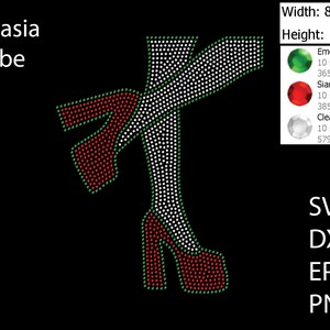 May include: A rhinestone design of a pair of high heels with green and red accents. The design is 8.92 inches wide and 11.07 inches tall.