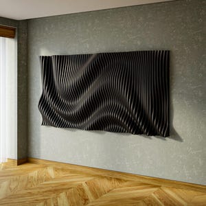 Parametric wall art design in matte black, wavy wall sculpture on a modern interior wall, custom CNC cutting files for routers and lasers, feature wall decor for studios and offices.