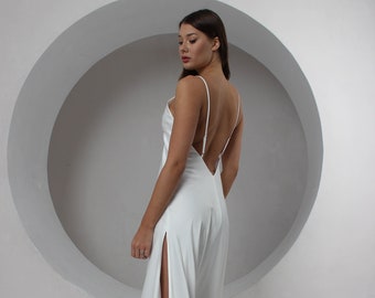 Simple wedding ivory dress with a slit Open back beach cocktail dress with V-neckline Minimalist wedding dress with a slit and straps