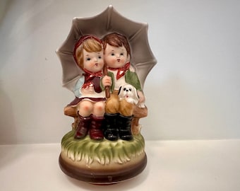 Vintage Hummel Style Fred Roberts Music Box - Plays Raindrops Keep Falling on my Head