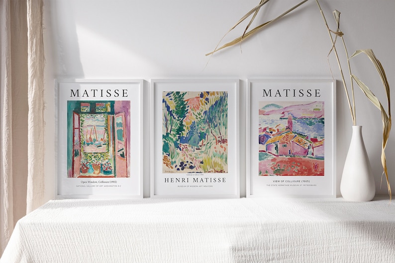May include: Three framed art prints featuring colorful abstract paintings by Henri Matisse. The prints are titled "Open Window, Collioure 1905", "Henri Matisse" and "View of Collioure, 1905".
