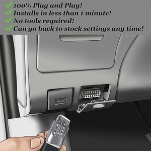 May include: A close-up of a car's interior showing a gray plastic connector with a black cable plugged into it. The connector is labeled with small white numbers. The text "100% Plug and Play!" is visible in the top left corner of the image.
