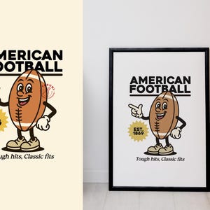 May include: A black framed poster with a cartoon illustration of an American football with a smiling face. The text "AMERICAN FOOTBALL" is above the football and "EST. 1869" is below the football. The text "Tough hits, Classic fits" is at the bottom of the poster.