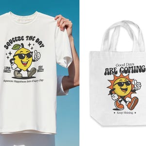 May include: White tote bag with a yellow sun cartoon wearing sunglasses and the text "Good Days Are Coming" and "Keep Shining".