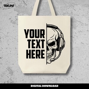 May include: Cream-colored tote bag featuring a black graphic of a skull wearing a headset. The left side of the bag has the text "YOUR TEXT HERE" in bold, black letters. The bag has two cream-colored handles and the words "DIGITAL DOWNLOAD" at the bottom.
