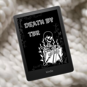 May include: A black and white image of a skeleton reading a book on a Kindle e-reader. The text on the screen reads "Death by TBR".