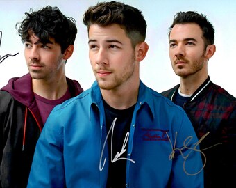 The JONAS BROTHERS Signed Photo X3 - Kevin Jonas, Nick Jonas, Joe