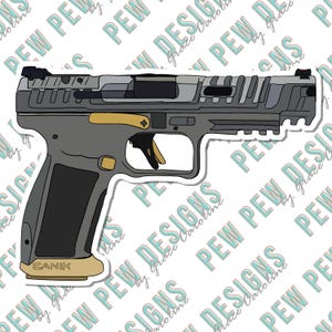 May include: A black and gray handgun with a gold accent on the slide and a tan grip. The gun has a black barrel and a silver magazine. The text "CANIK" is printed on the grip.
