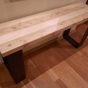 Wooden bench with steel industrial legs