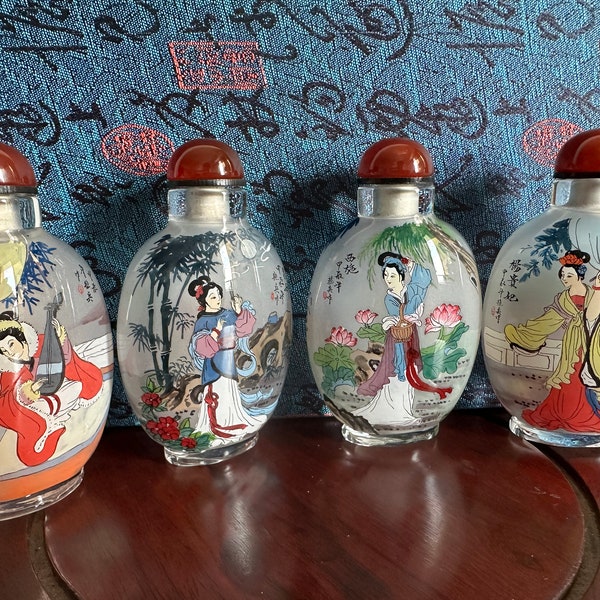 4 beautiful inside-painted glass snuff bottles